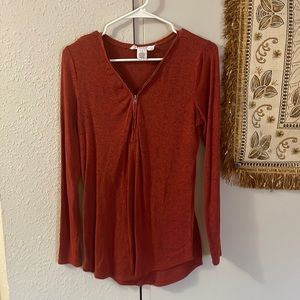 Red long sleeve shirt with front zipper